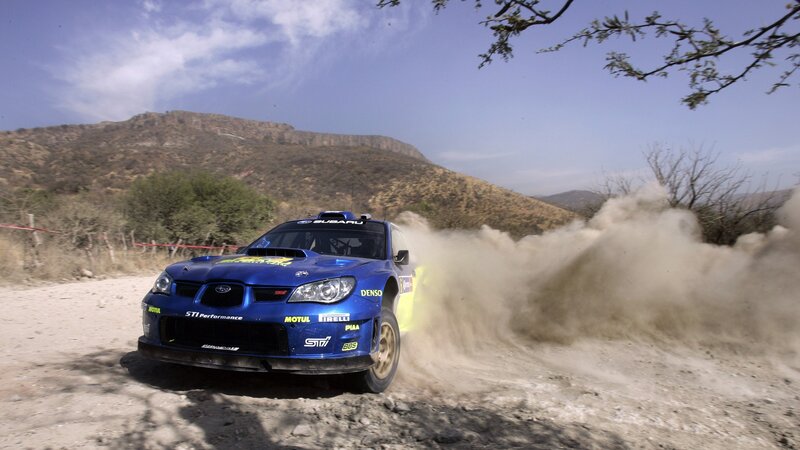 Blue Rally Car — Dynamic, Afternoon, Photograph, Dust Cloud, Mountain
