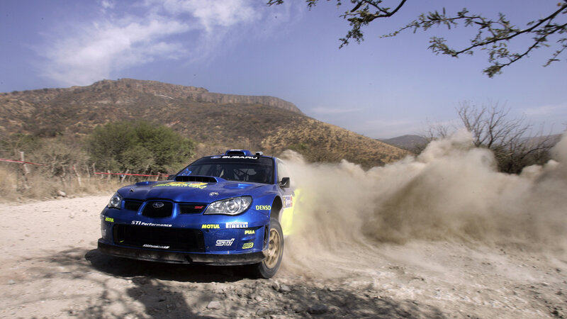 Blue Rally Car — Dynamic, Afternoon, Photograph, Dust Cloud