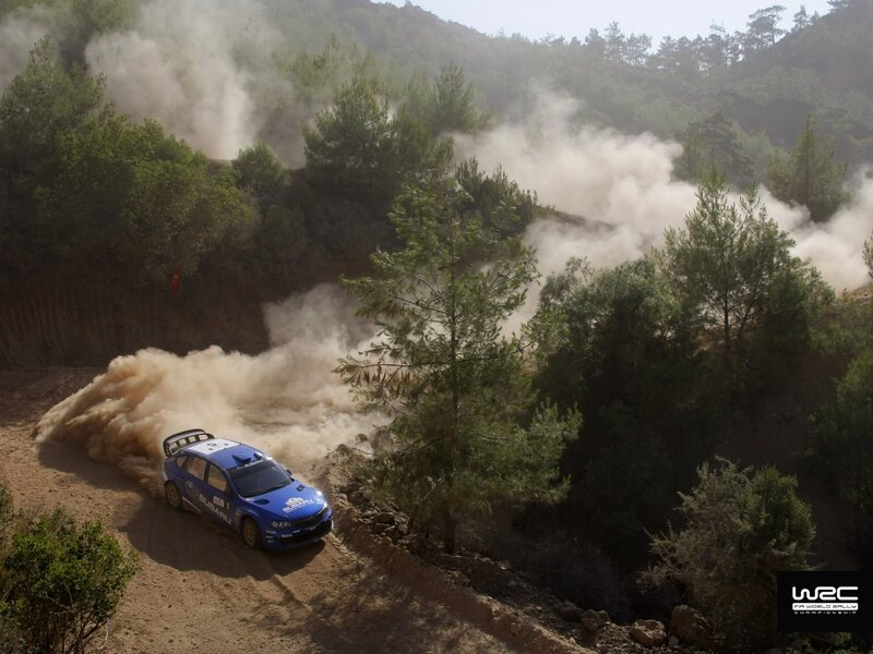 Blue Rally Car — Dynamic, Afternoon, Photograph, Dust Cloud, Trees