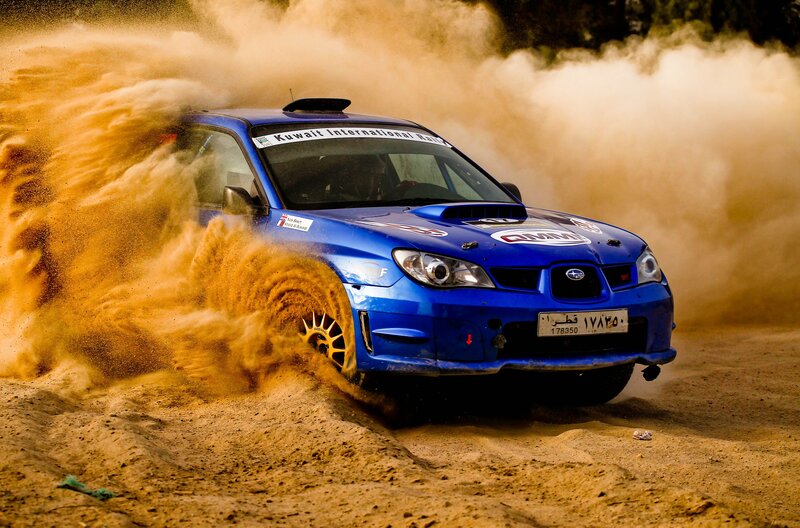 Blue Rally Car — Dynamic, Afternoon, Photograph, Dust, Sand