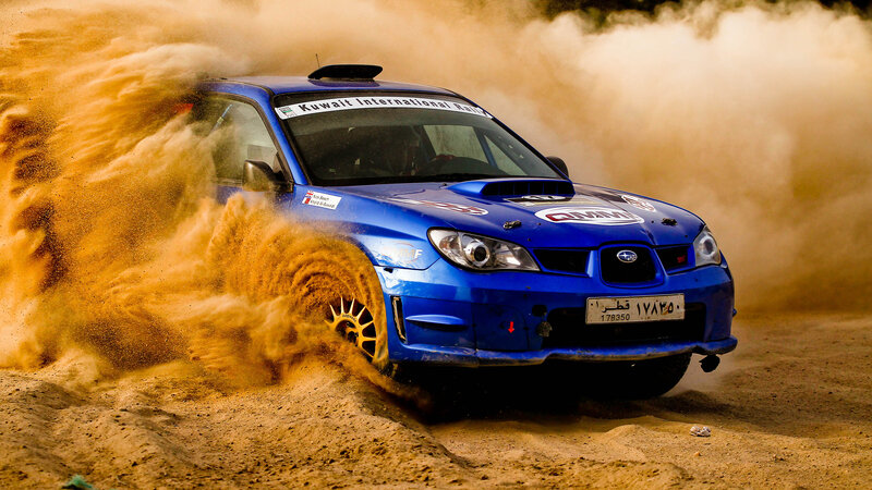 Blue Rally Car — Dynamic, Dusty