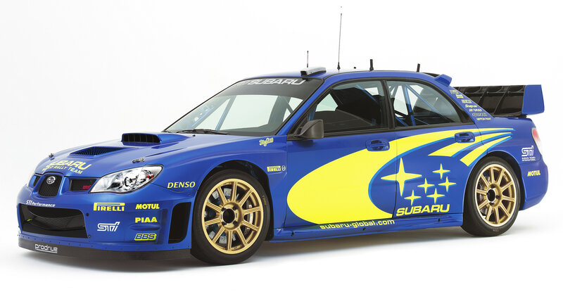 Blue Rally Car — Dynamic, Photograph, Gold Wheels