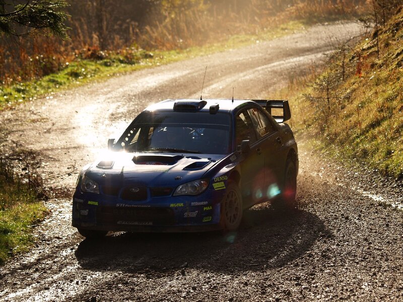 Blue Rally Car — Dynamic, Sunset