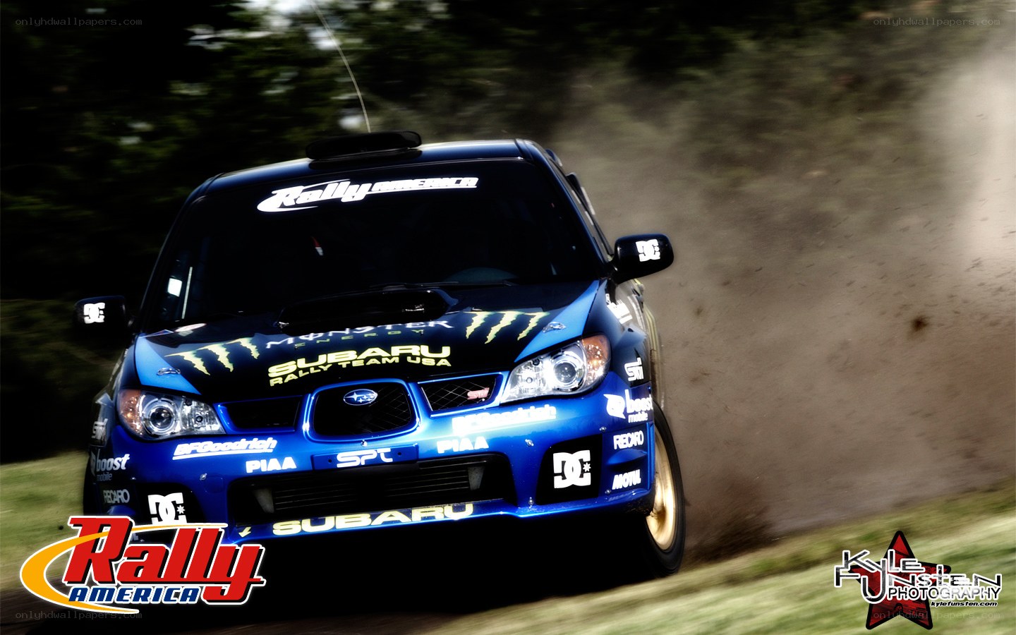 Blue rally car in action