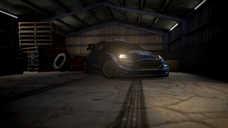 Blue Rally Car in Garage