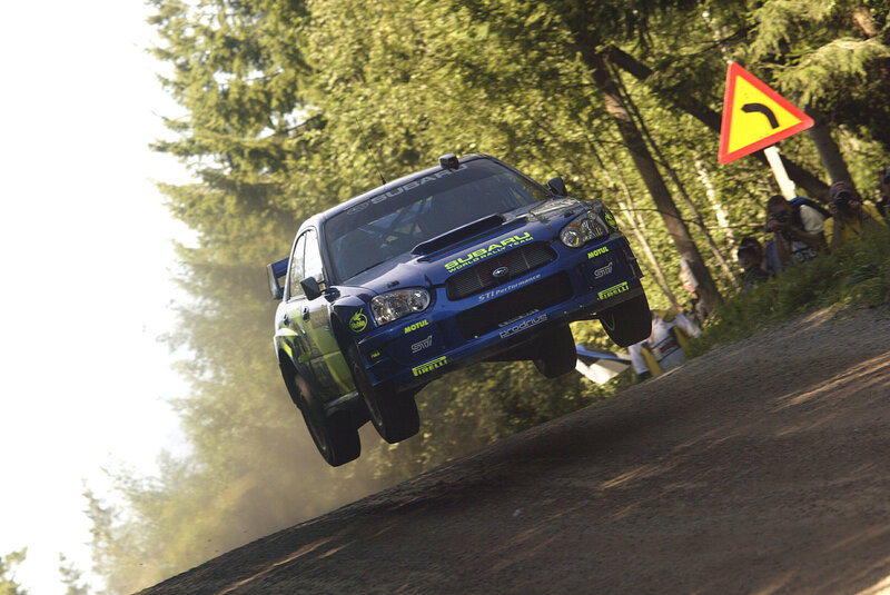 Blue Rally Car in Mid-air — Dynamic