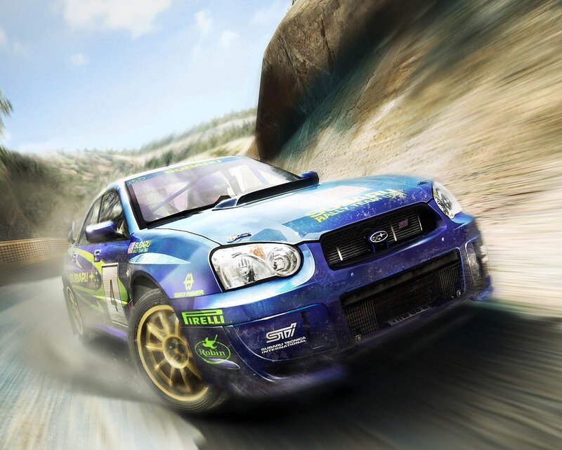 Blue rally car in motion