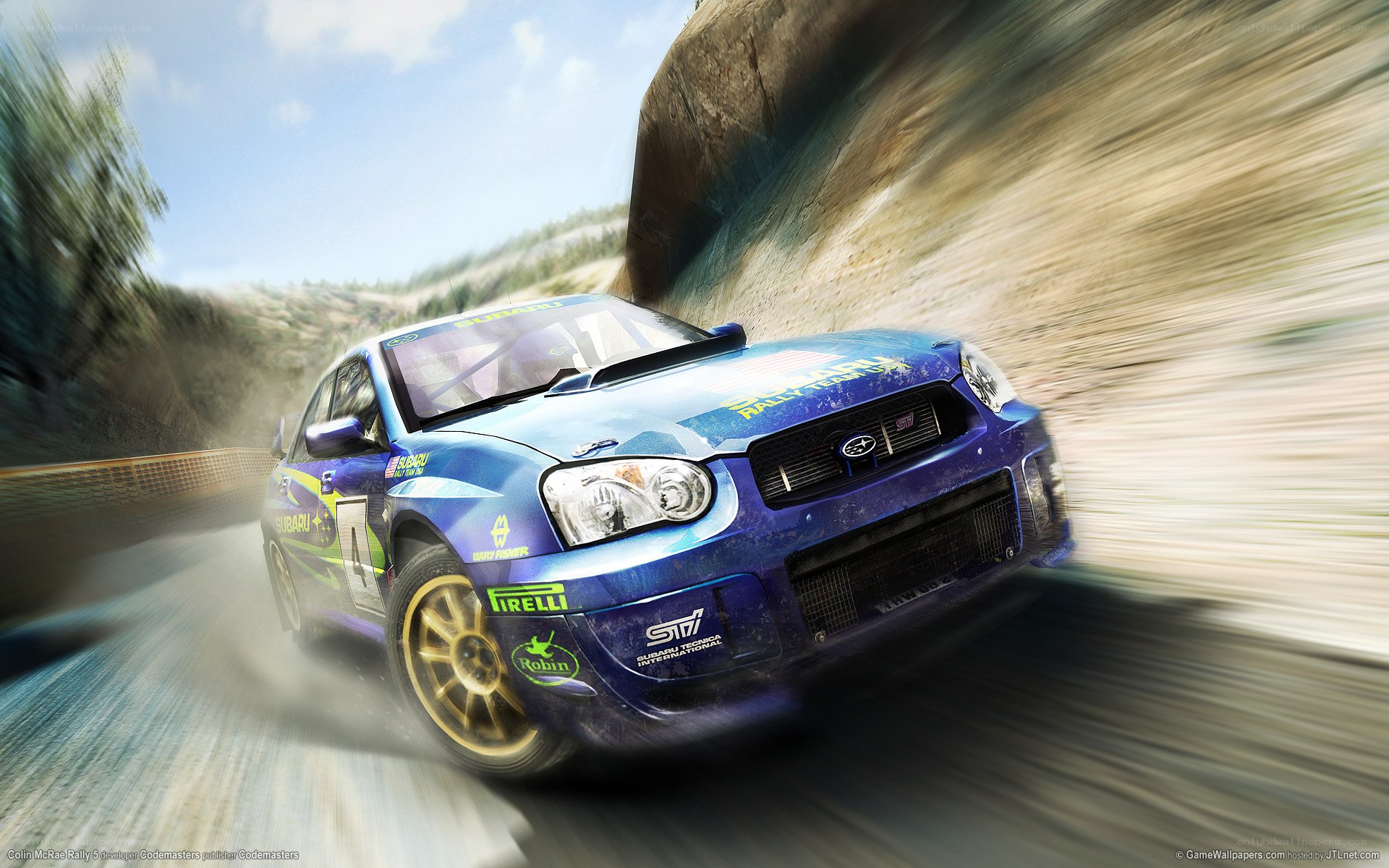 blue rally car in motion