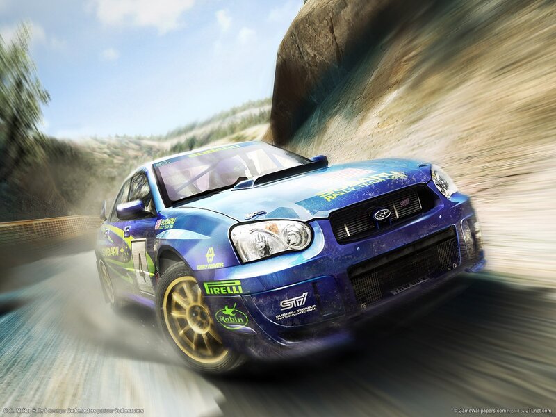 blue rally car in motion