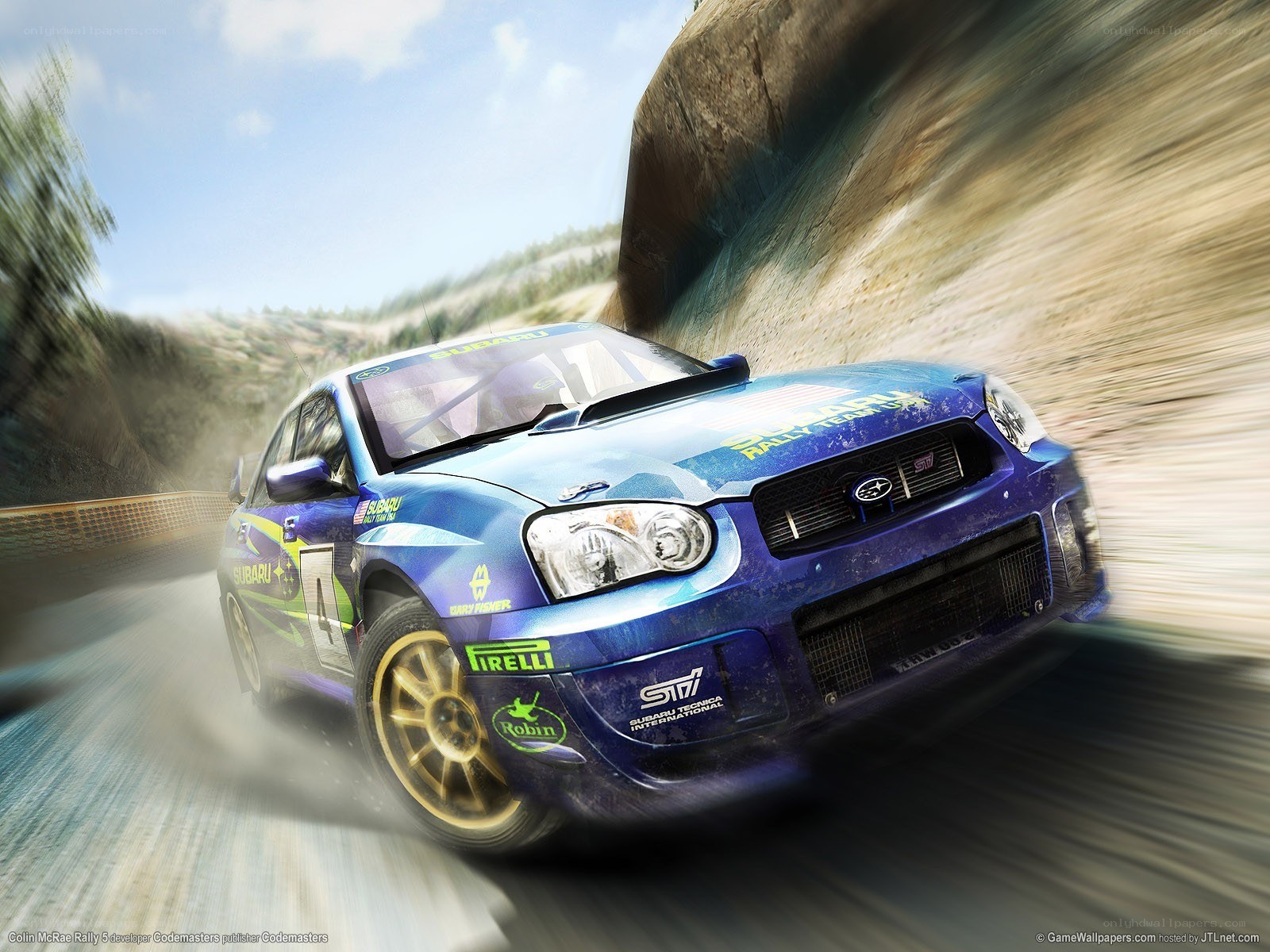 blue rally car in motion