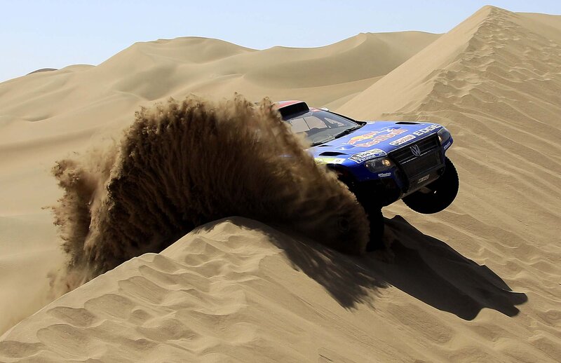 Blue Rally Car in Sand