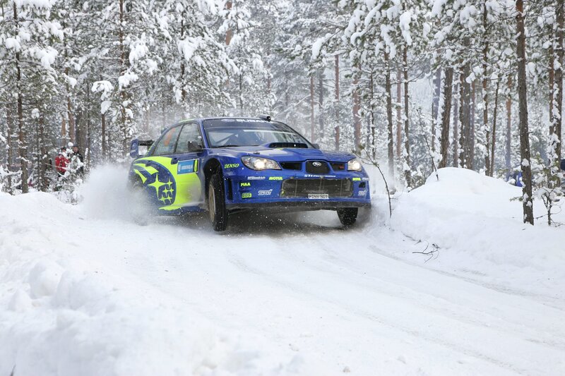 Blue Rally Car in Snow — Dynamic, Winter, Photograph, Snowy Forest, Spectators