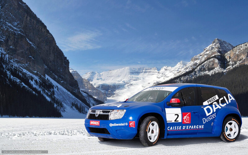 Blue rally car in snowy mountains