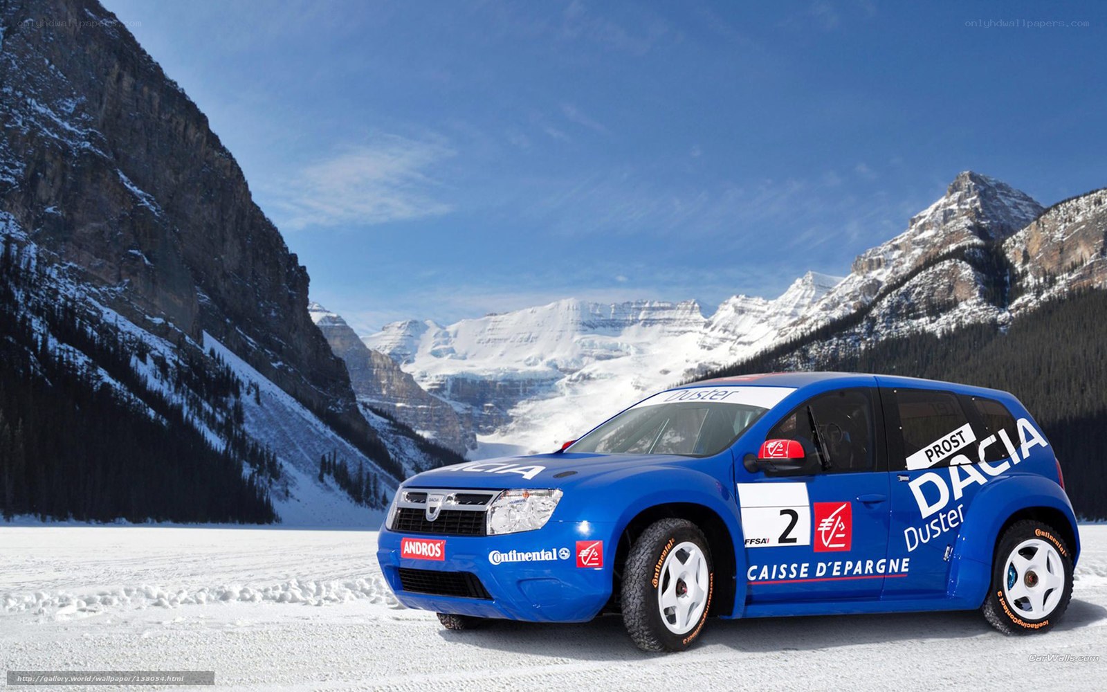 Blue rally car in snowy mountains