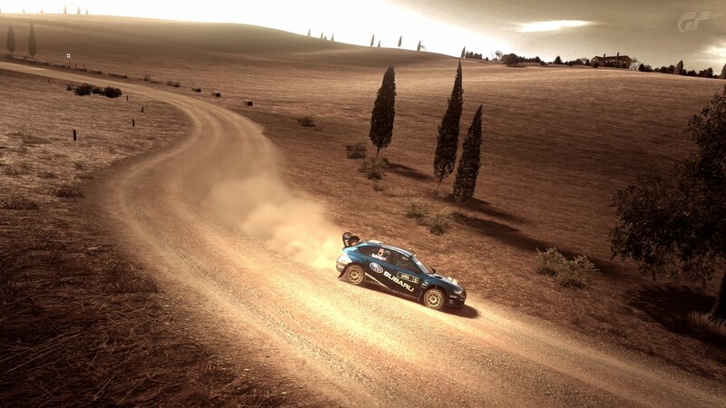 Blue Rally Car on Dirt Road — Brown, Dramatic
