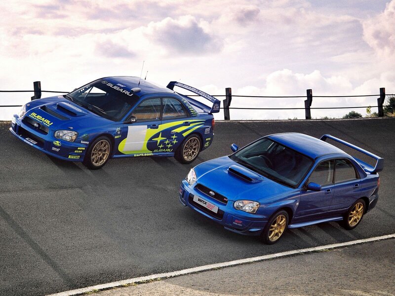 Blue Rally Cars on Track