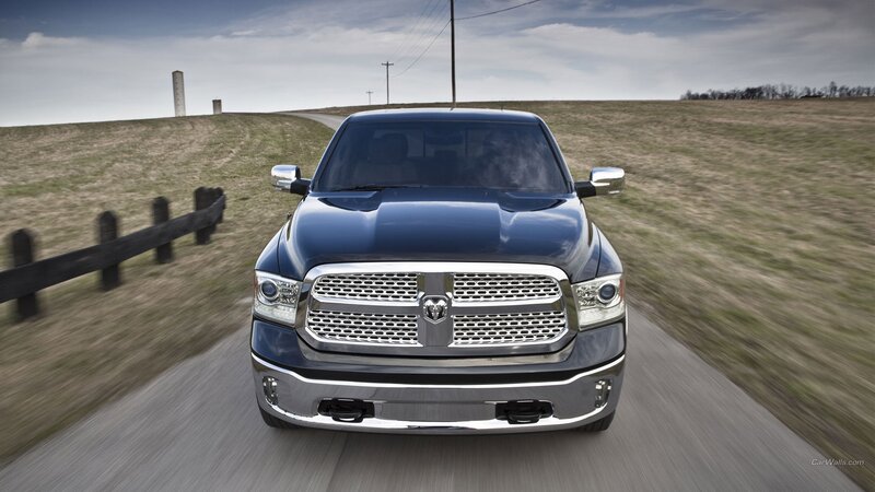 blue ram truck on country road