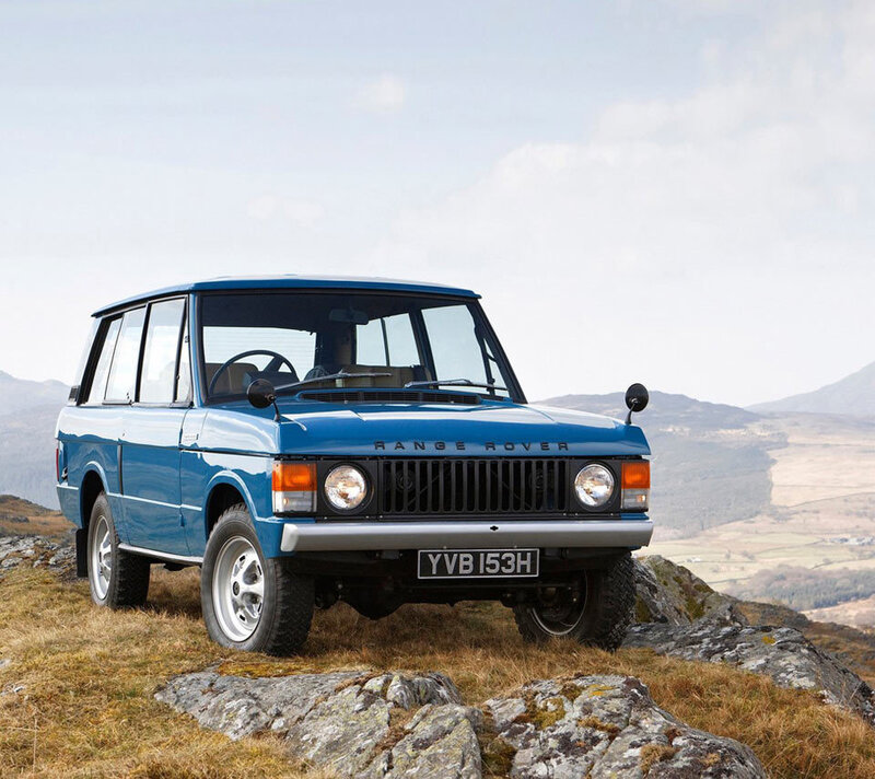 Blue Range Rover on a hill
