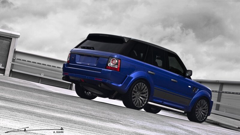blue range rover on ramp