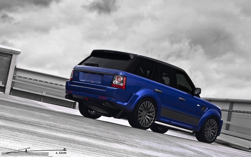 blue range rover on ramp