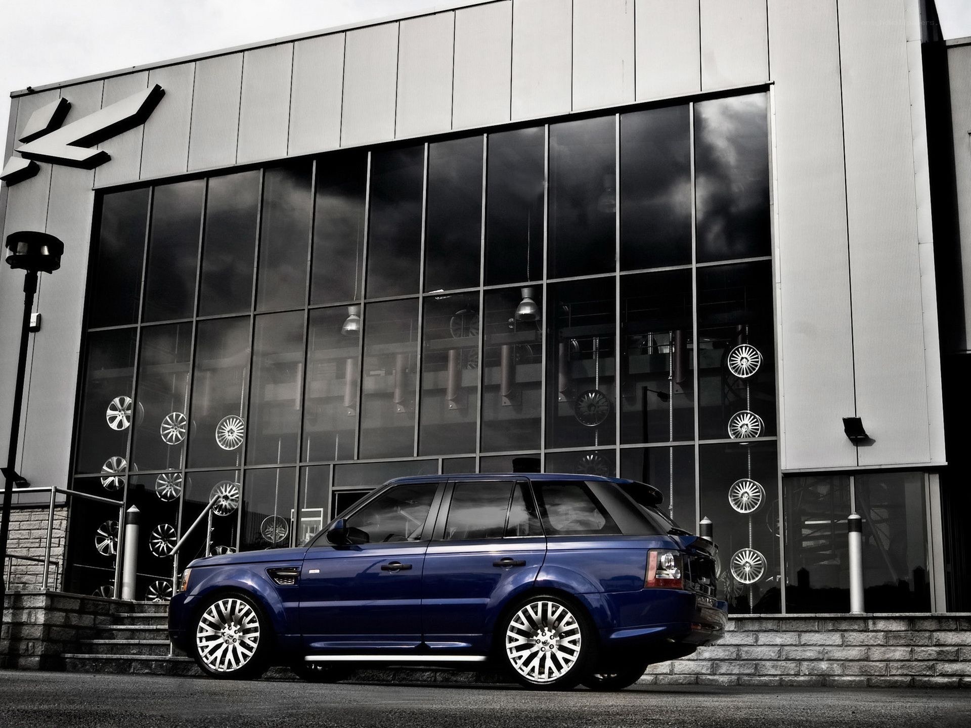 Blue Range Rover outside dealership