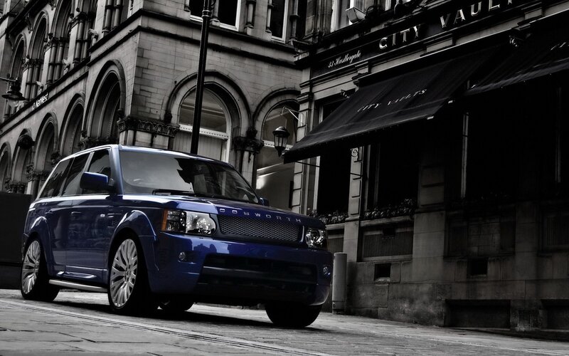 Blue Range Rover Suv — Dramatic, Photograph, Building, Street, Awning