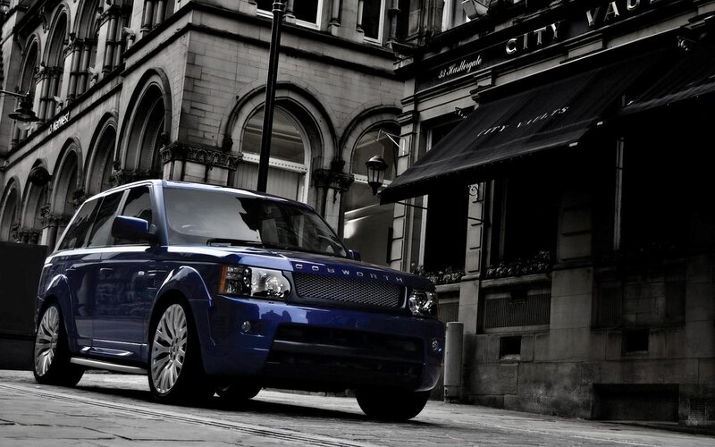 Blue Range Rover Suv — Dramatic, Photograph, Building, Street