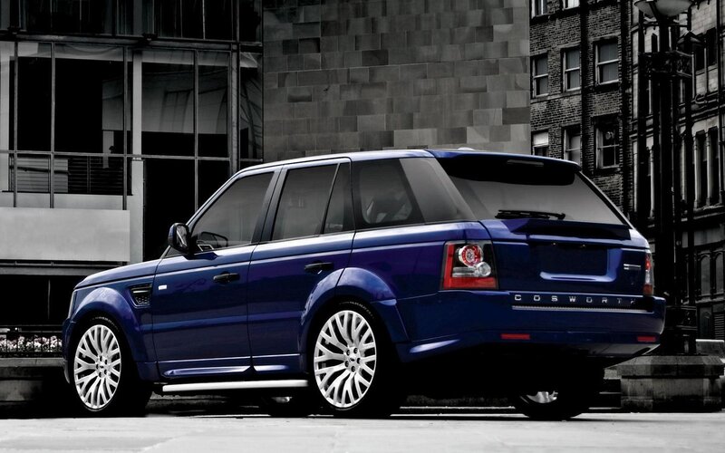 Blue Range Rover Suv — Dramatic, Photograph, Building