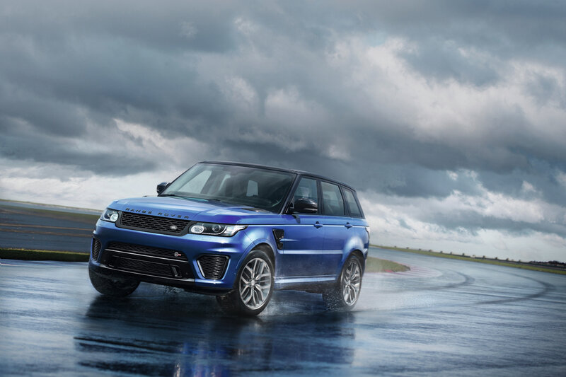 Blue Range Rover Suv — Dramatic, Photograph, Wet Track