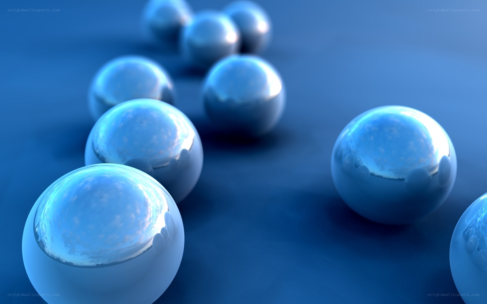 Blue reflective spheres on blue surface