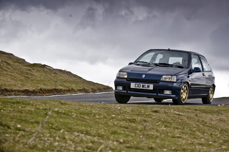 Blue Renault Clio Car — Dramatic