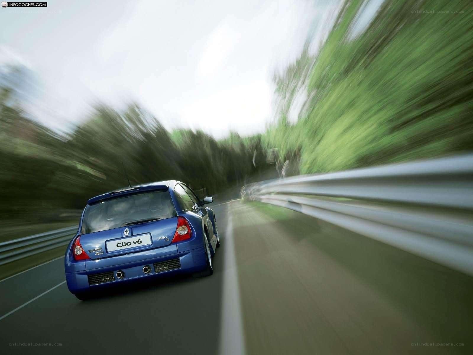 Blue Renault Clio V6 in motion