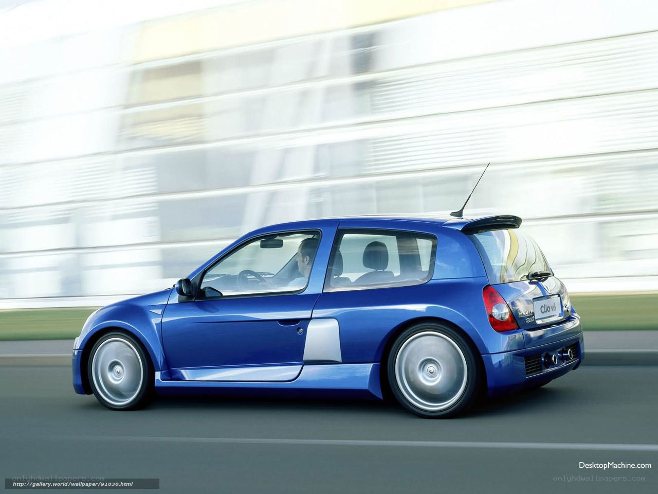 blue renault clio v6 in motion