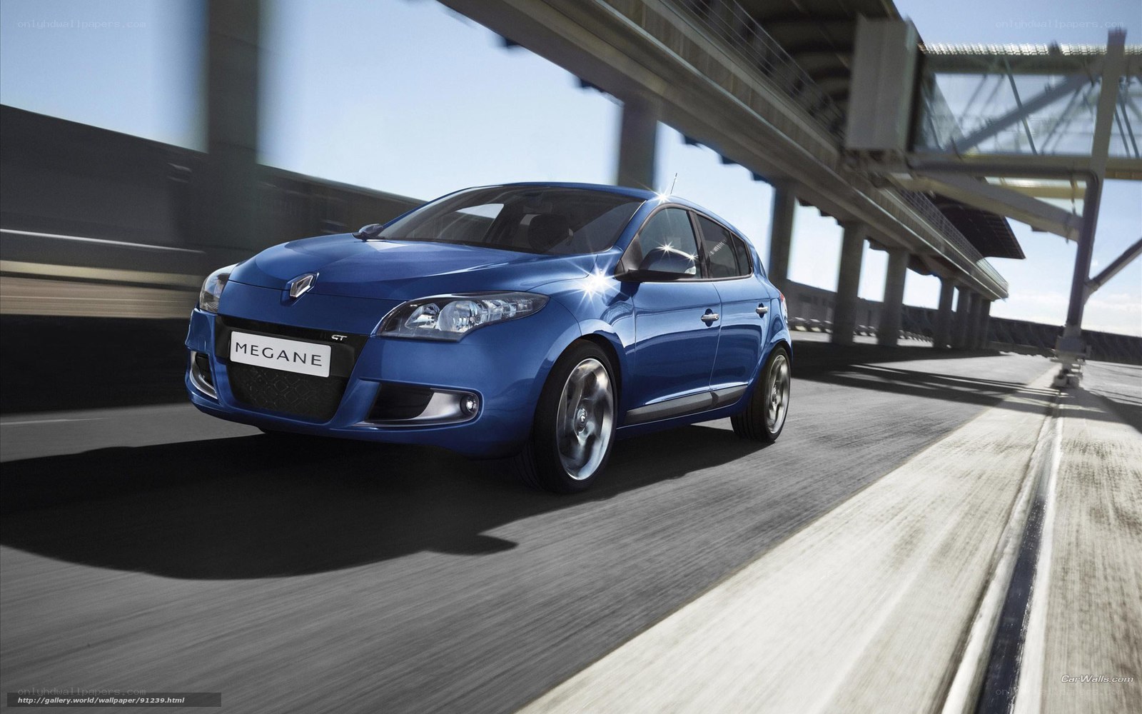 Blue Renault Mégane GT in motion
