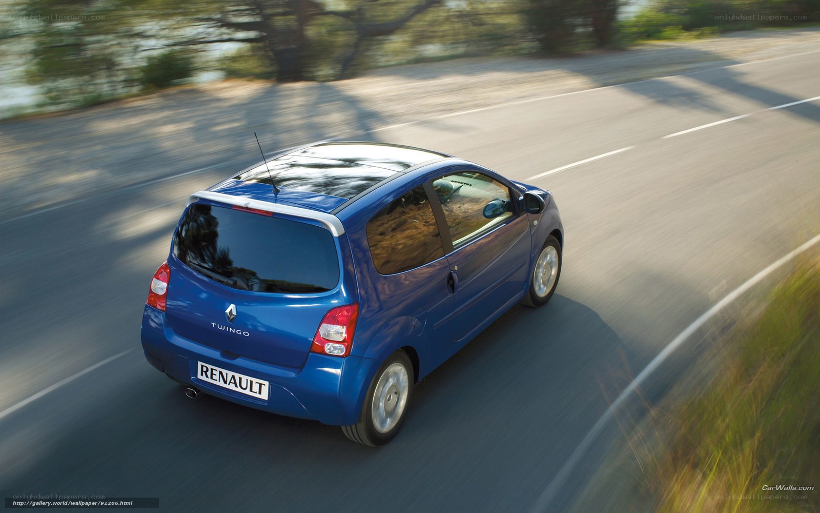 Blue Renault Twingo in motion