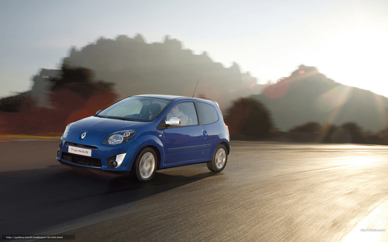 Blue Renault Twingo in motion