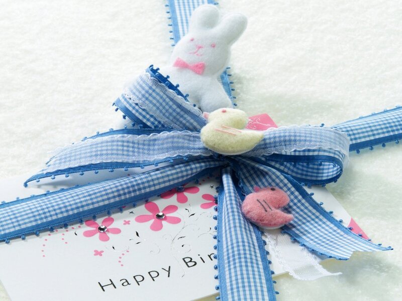 Blue ribbon gift with bunny