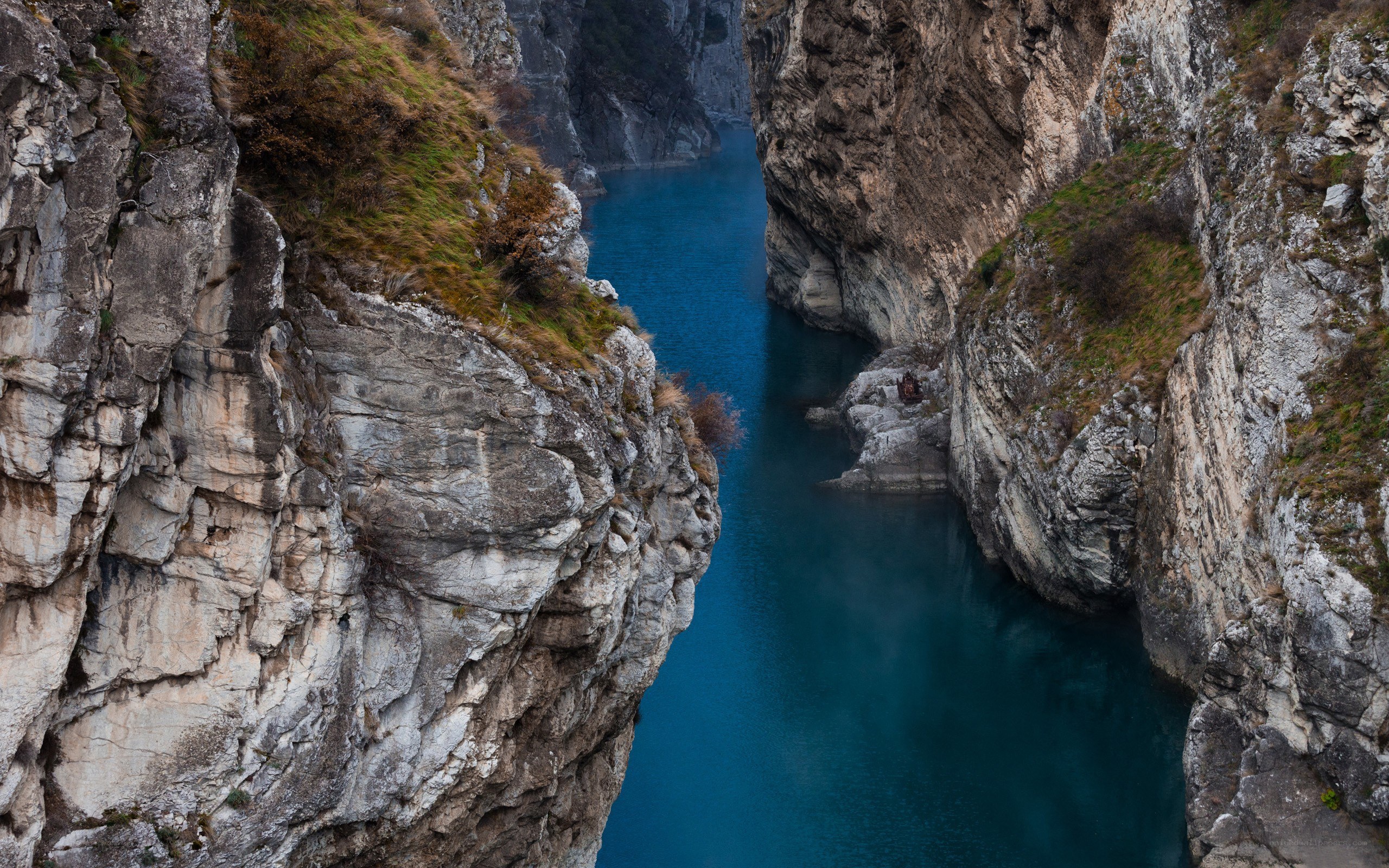 Blue river in a deep canyon