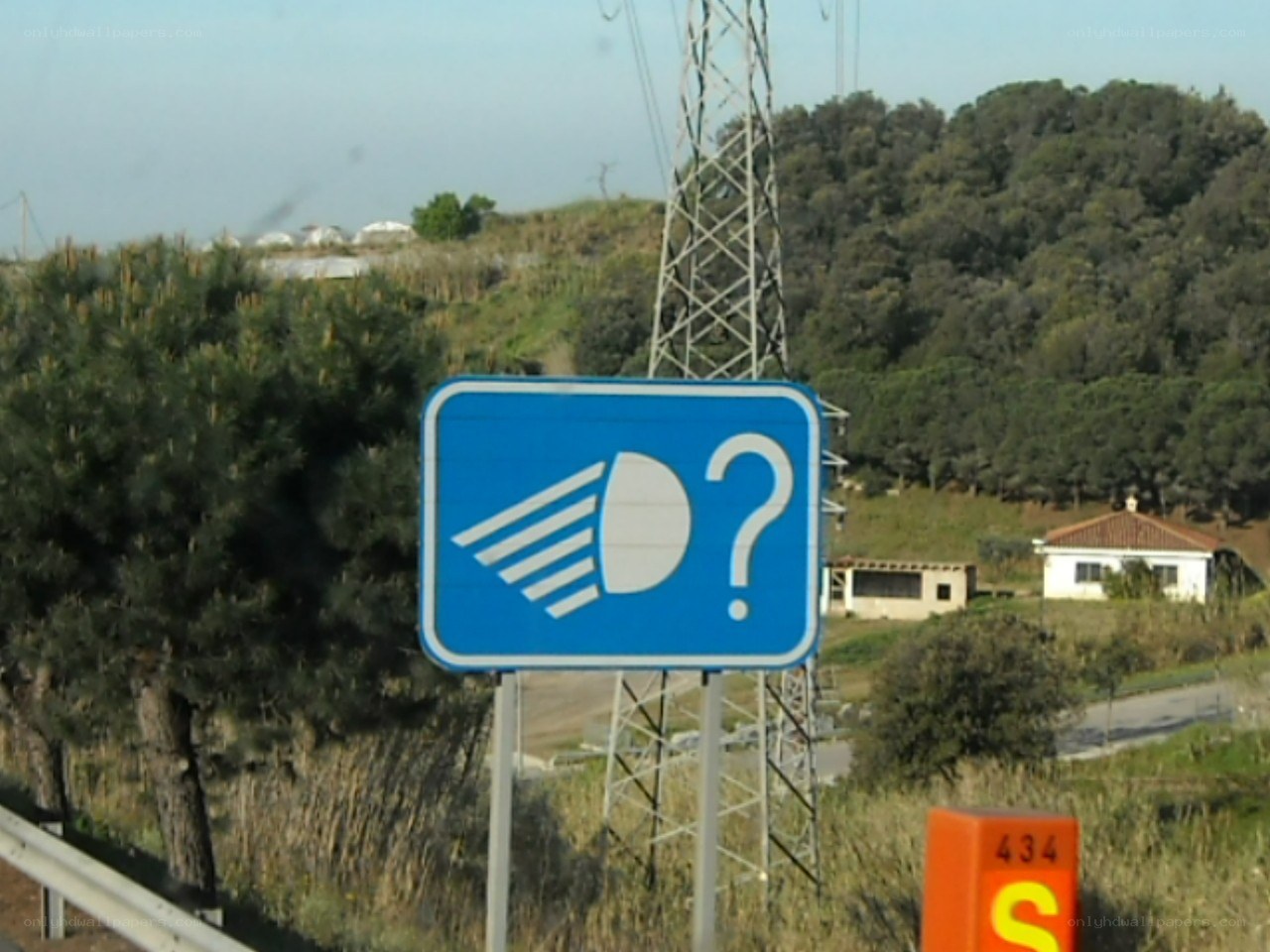 Blue road sign with question mark