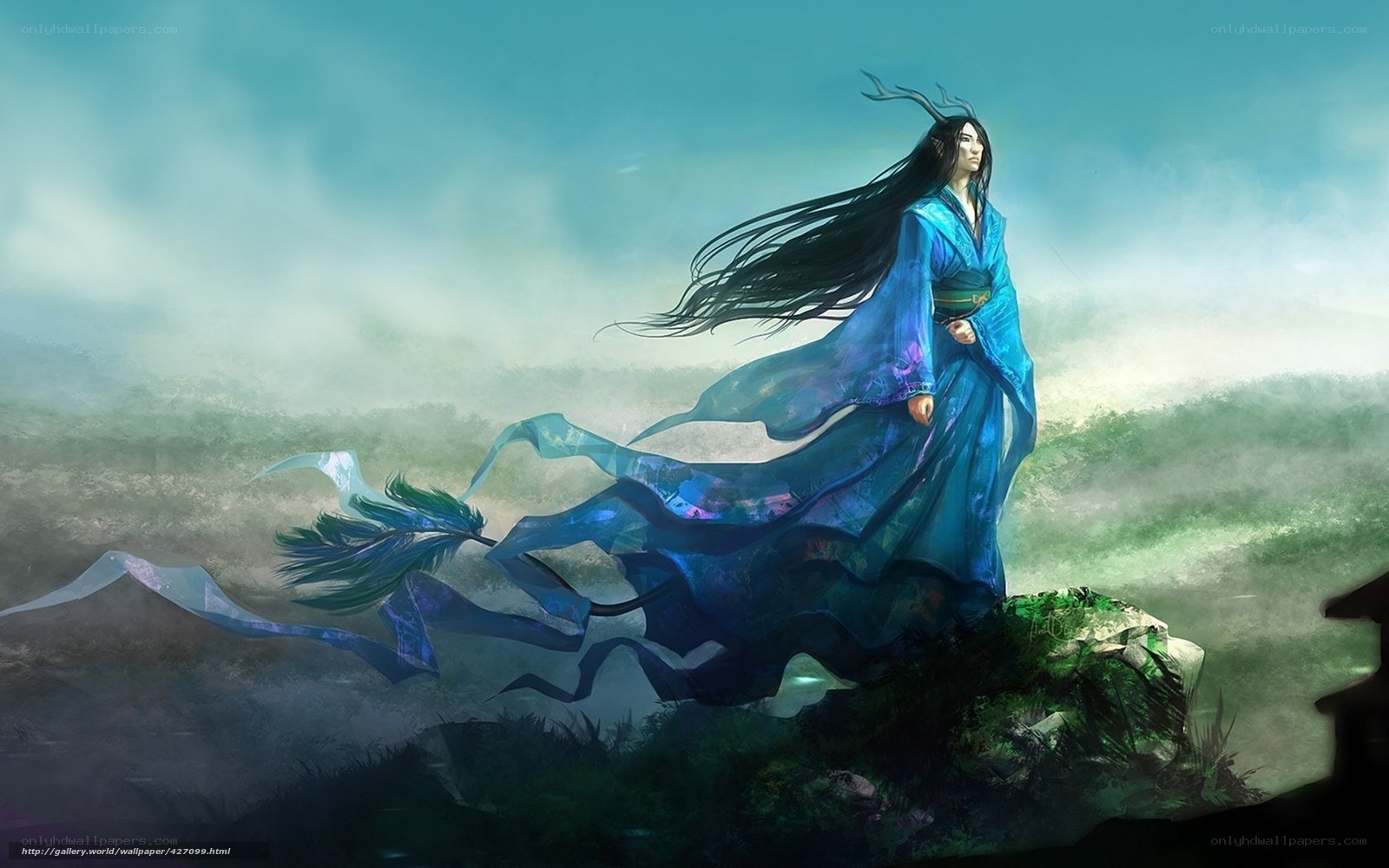 blue-robed figure on a cliff