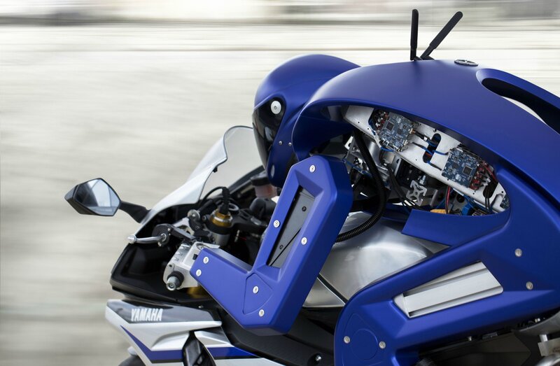 Blue Robot on Motorcycle