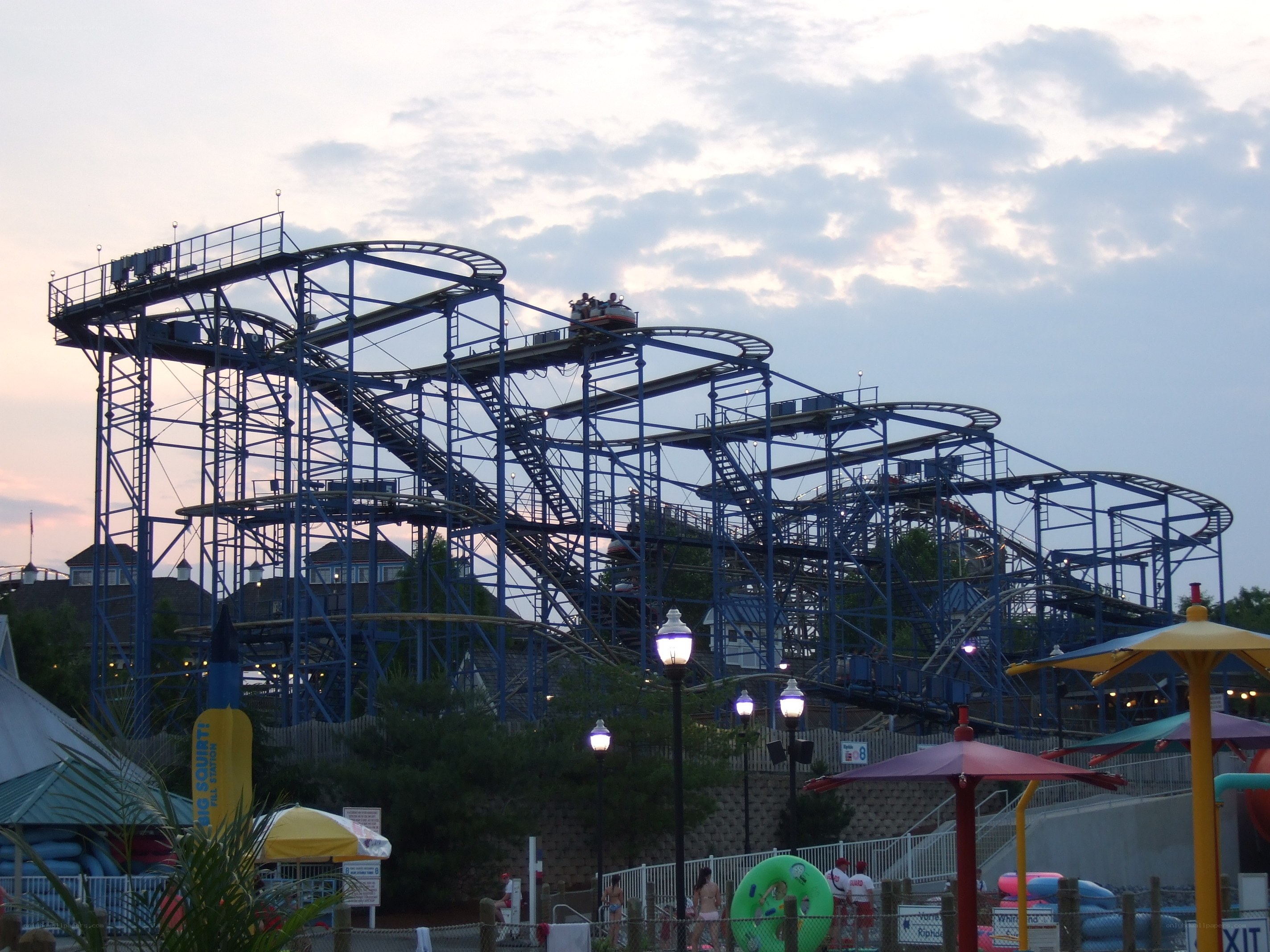 Blue roller coaster at amusement park