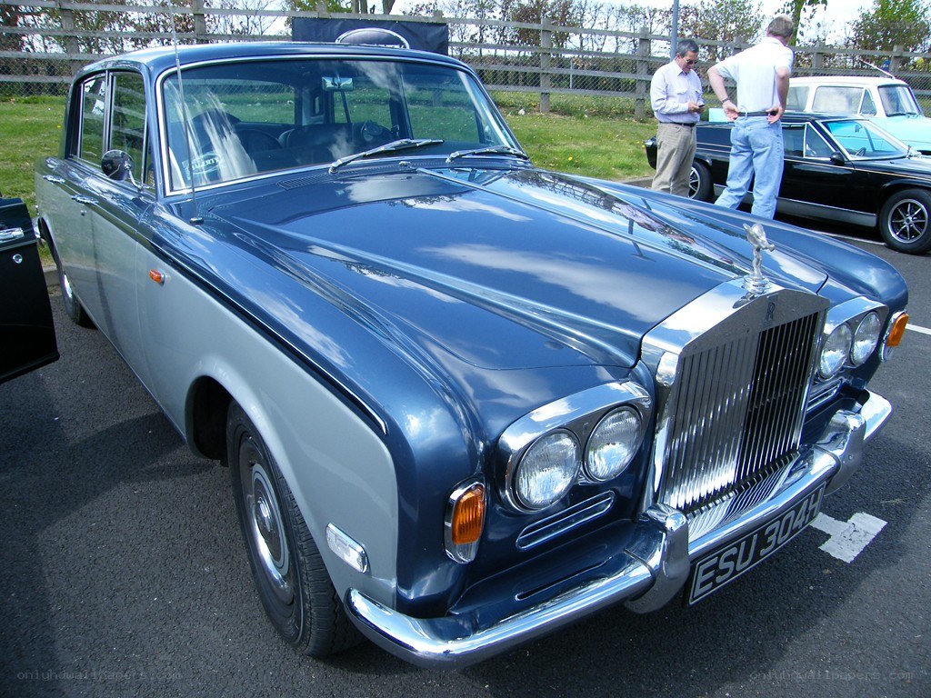 blue rolls-royce at car show