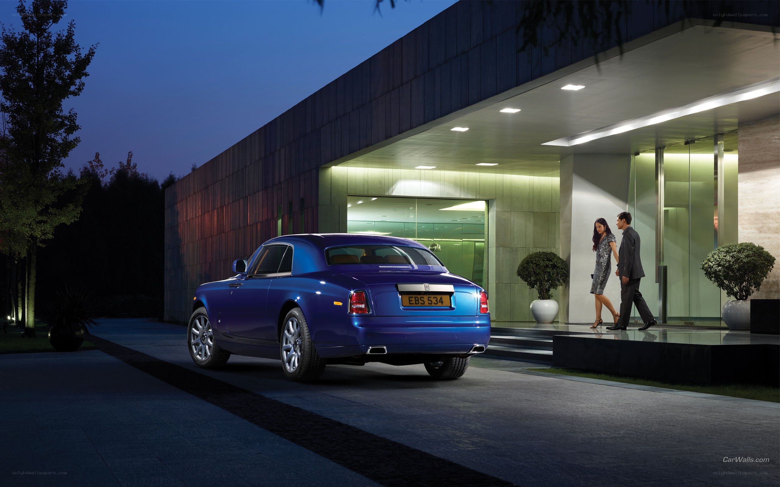 Blue Rolls-Royce at luxury residence