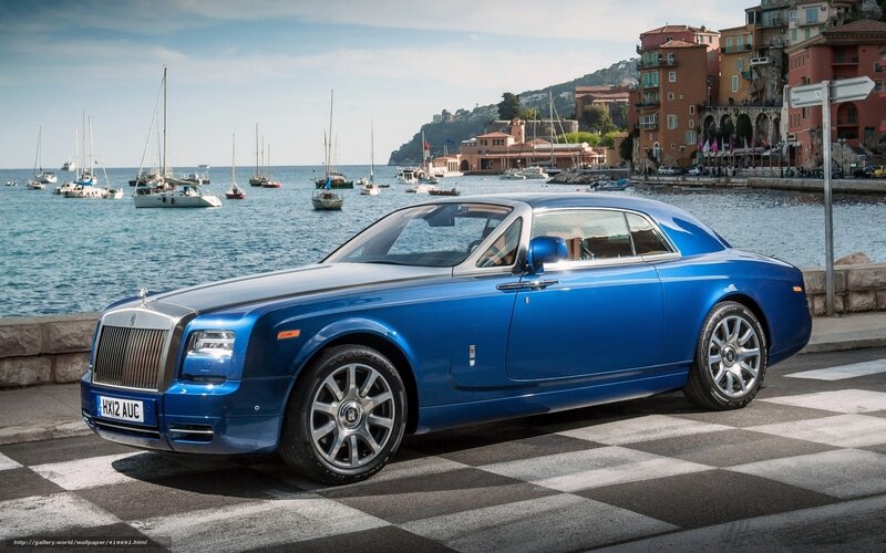 Blue Rolls-Royce by the harbor