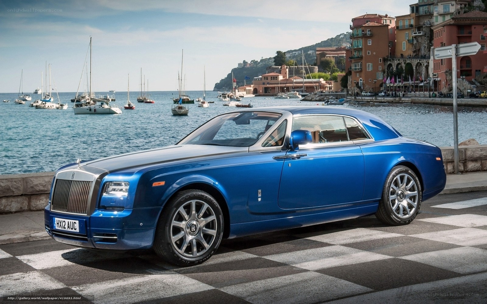 Blue Rolls-Royce by the harbor