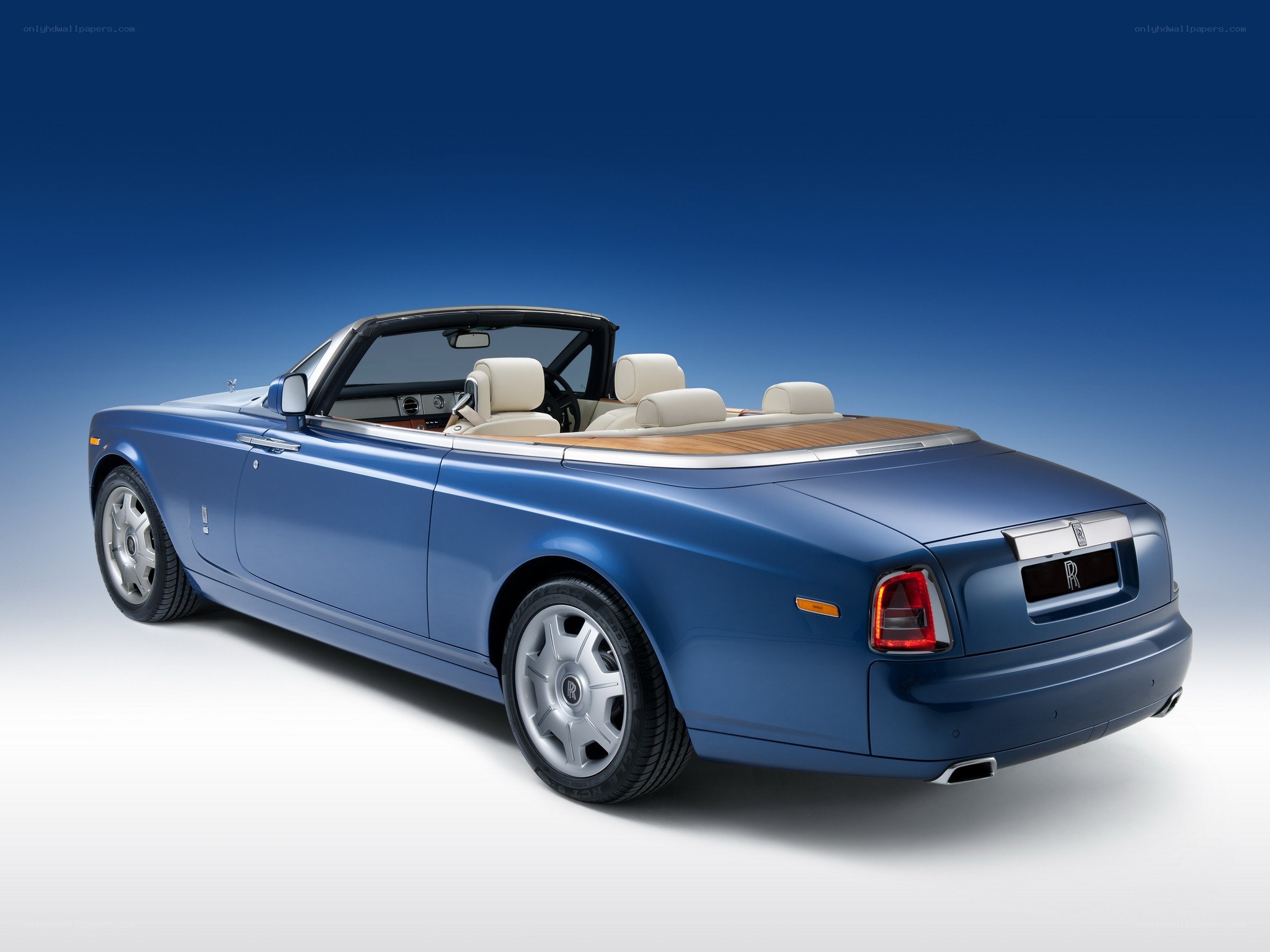 blue rolls-royce convertible