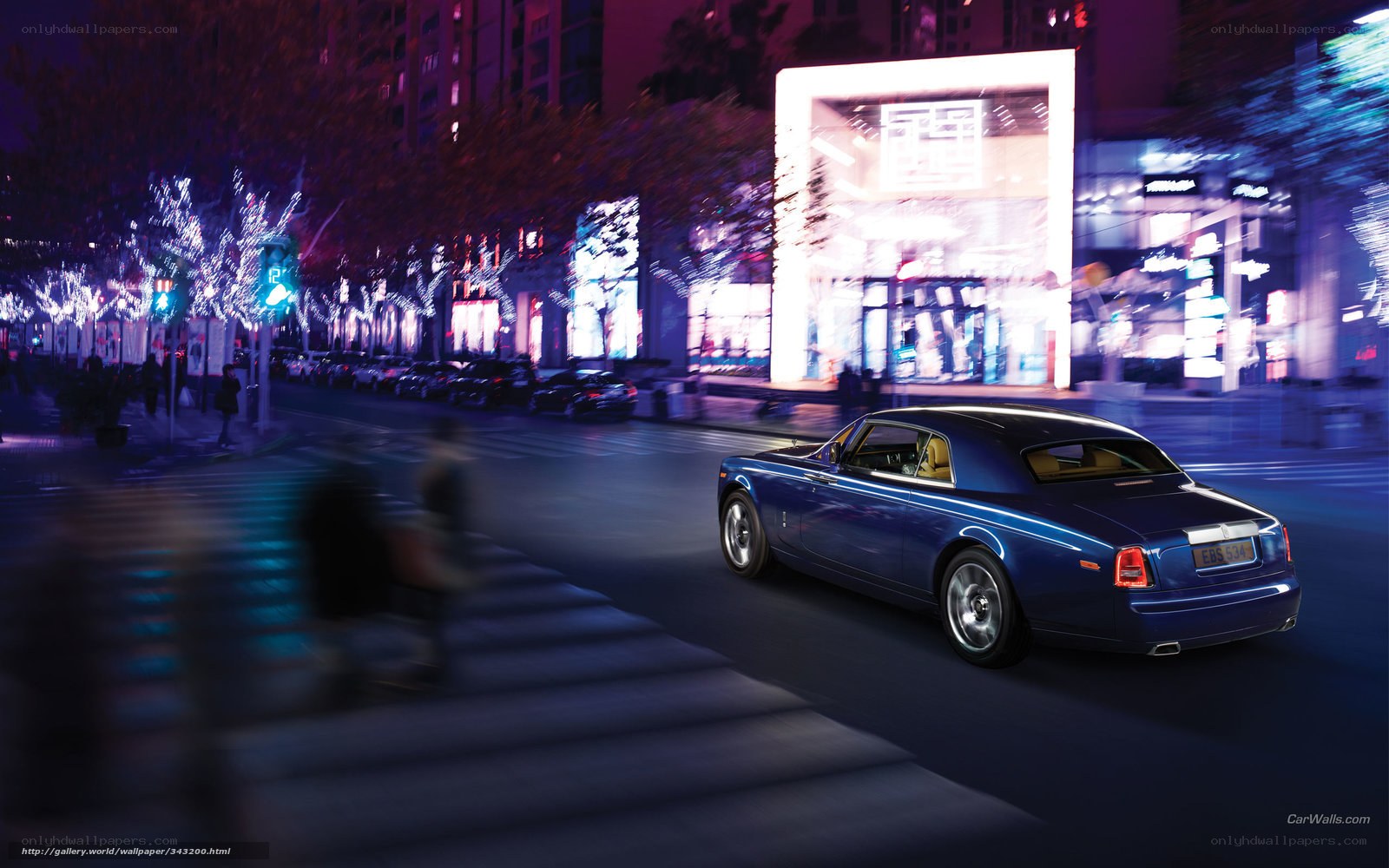 Blue Rolls-Royce on city street