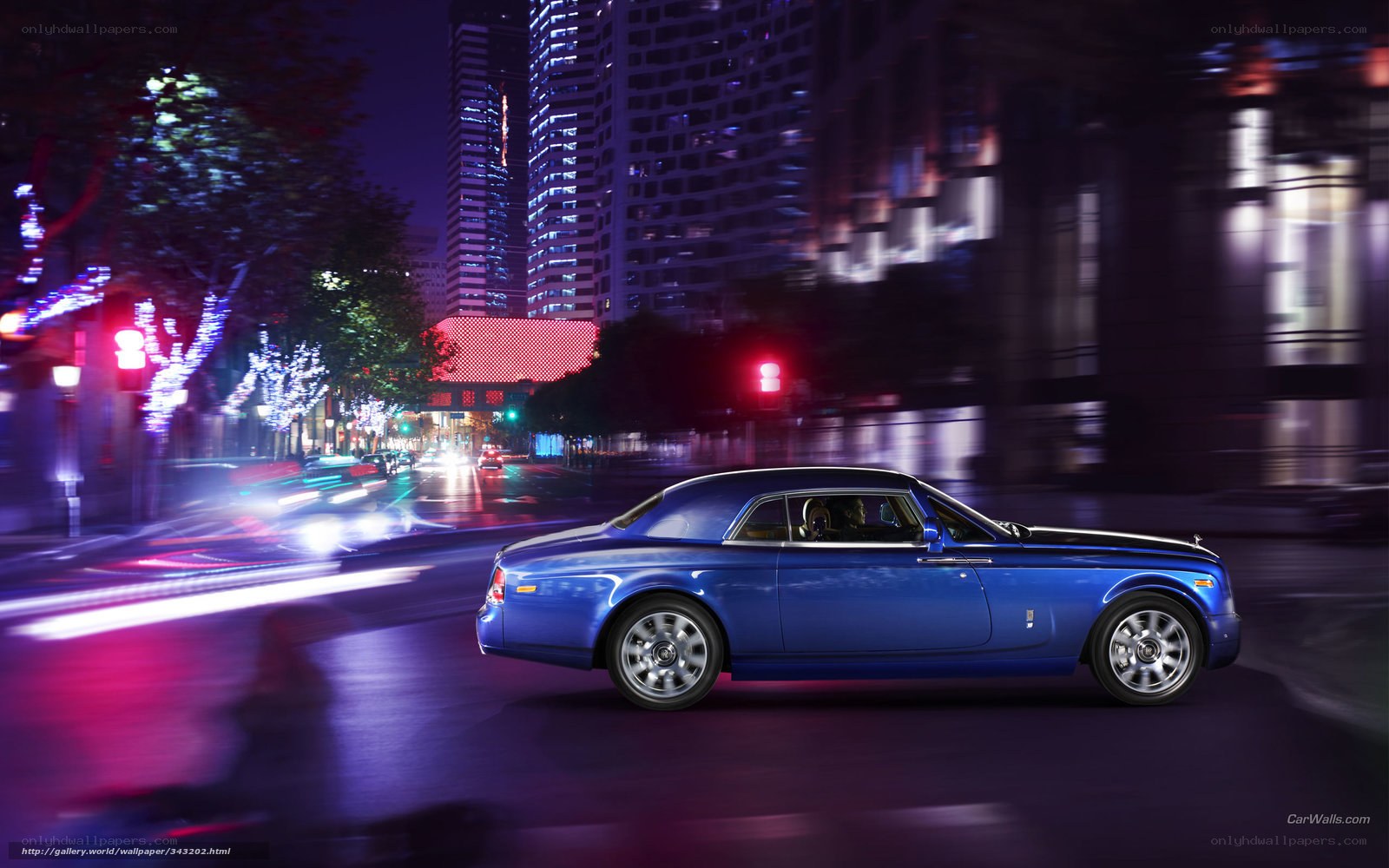 Blue Rolls-Royce on city street