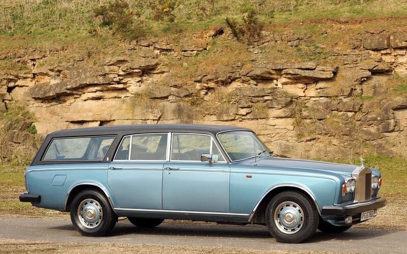 blue rolls-royce station wagon